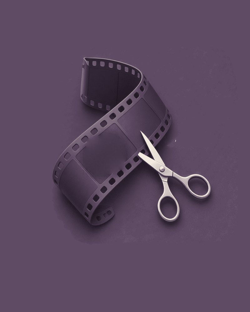 A strip of film and a pair of scissors